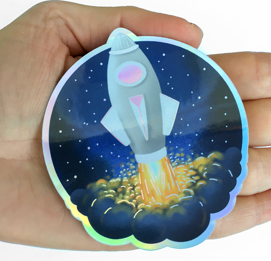 Holografická vodeodolná nálepka Raketa