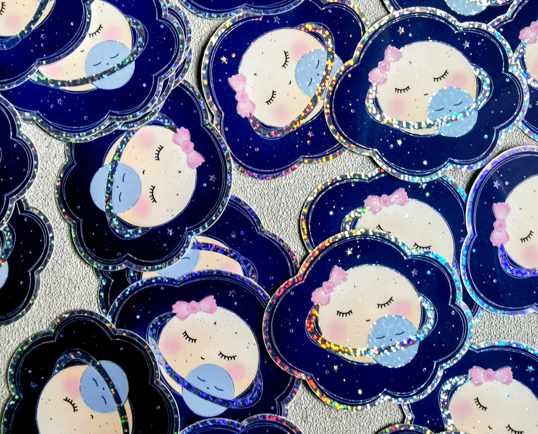 Trblietavá vodeodolná nálepka Planéta